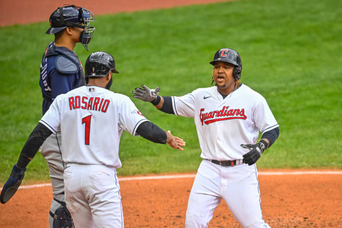 Jose Ramirez (right) celebrates his two-run home run with Amed Rosario in Cleveland's victory over Tampa Bay in Game 1 of their wild-card series (USA TODAY Sports)
